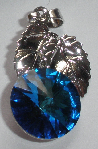 Přívěsek Swarovski List s Rivoli Bermuda Blue rhodiovaný (SwPrLi_33)